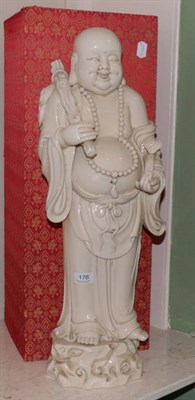 Lot 176 - A modern Chinese Blanc de Chine figure of a Buddha holding a ruyi scepter, 65cm high