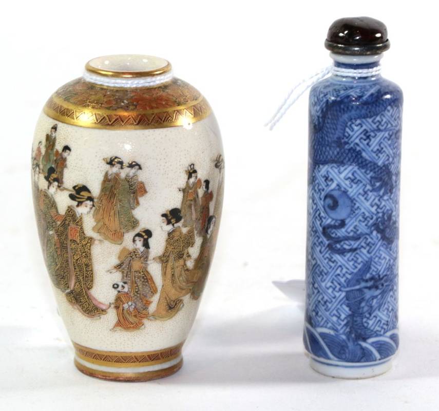 Lot 289 - A Chinese blue and white snuff bottle of rouleau form, seal marks to base, dragon design, 9cm...