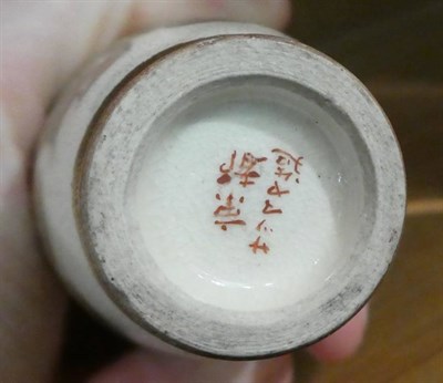 Lot 289 - A Chinese blue and white snuff bottle of rouleau form, seal marks to base, dragon design, 9cm...