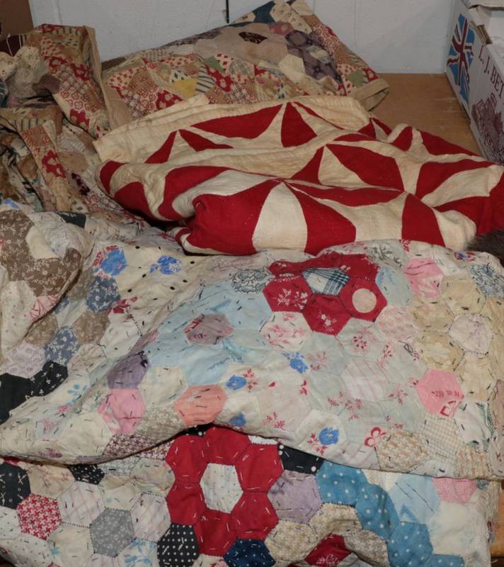 Lot 1009 - Late 19th century turkey red and white geometric patterned patchwork quilt, with cream reverse,...
