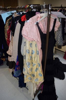 Lot 1053 - Quantity of late Victorian/Edwardian costume, skirts, bodices, capes etc (half a rail)