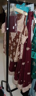 Lot 1062 - Bombay Stores Indian burgundy silk skirt and bodice, both with embroidered detailing, matching...