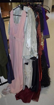 Lot 1076 - Assorted Academy Costume and other theatrical dresses etc (on rail)