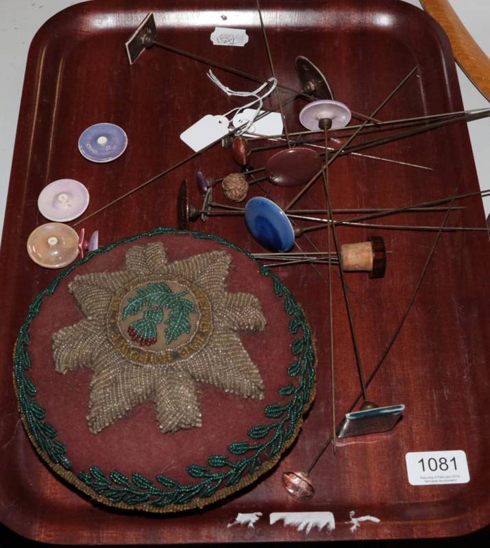 Lot 1081 - 19th century bead work circular pin cushion with central thistle, Ruskin pottery hat pins,...