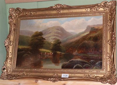 Lot 1126 - A Williams (19th/20th century) Cows watering in a mountainous landscape, signed, oil on canvas