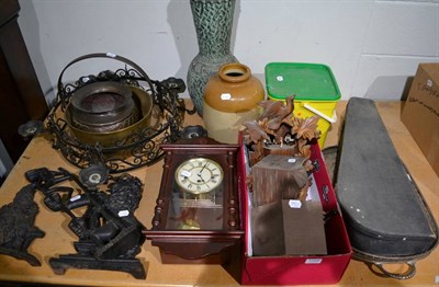 Lot 1188 - A mixed group of items including three cuckoo clocks, modern banjo, two Victorian cast iron...