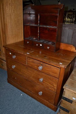 Lot 1218 - A mahogany three height chest of drawers with glass handles, together with a hanging shelf