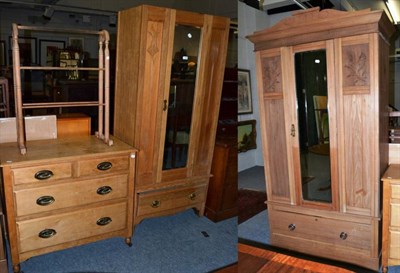 Lot 1219 - A pine mirror fronted wardrobe; another pine mirror fronted wardrobe; a pine chest of drawers;...