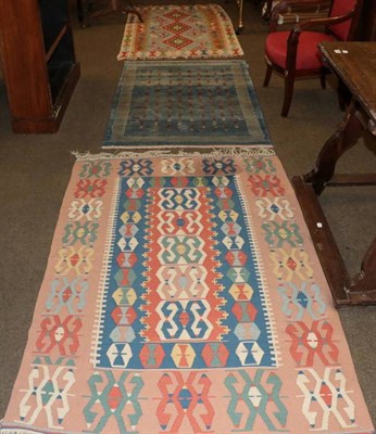 Lot 1249 - Gabbeh Rug West Iran, the shaded ice blue ground of plants and animals, 153cm by 99cm; together...