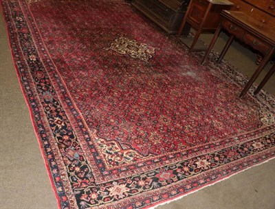 Lot 1253 - Hamadan Rug, Iranian Kurdistan, the strawberry Herati field with central medallion framed by indigo