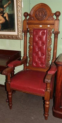 Lot 1266 - A carved oak armchair, late 19th century, the verso stamped ''Spencer & Co. Masonic...