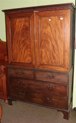 Lot 1267 - A George III mahogany linen press