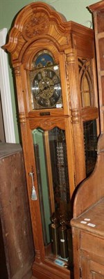 Lot 1274 - A modern chiming longcase clock, the arched dial with moon face and with retailers signature Howard