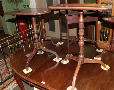 Lot 1280 - Two George III mahogany tilt top tripod tables each with rectangular tops (one dish)