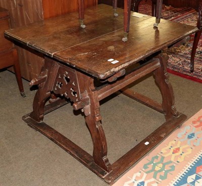 Lot 1286 - A 19th century oak camel saddle converted to a table