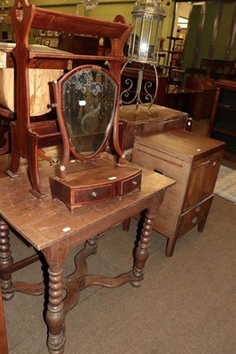 Lot 1287 - A 19th century mahogany shield form toilet mirror and a two tier book trough (2)