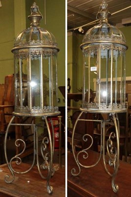 Lot 1291 - A pair of lanterns on stands