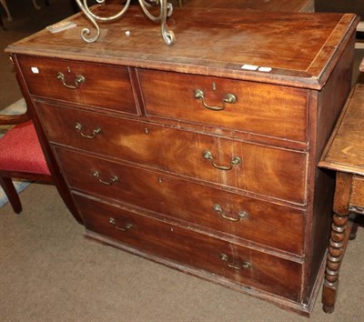 Lot 1294 - A George III mahogany four height chest of drawers and an oak side table (2)