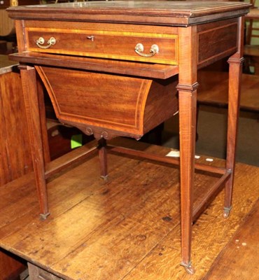 Lot 1300 - An inlaid mahogany work box/games table