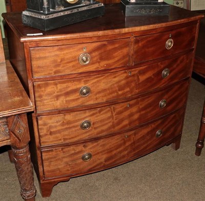 Lot 1316 - A George III mahogany, boxwood and ebony strung bowfront chest of drawers, early 19th century,...