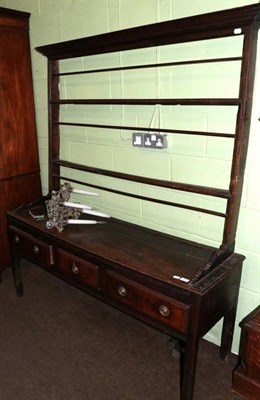 Lot 1323 - An 18th century and later oak dresser and rack