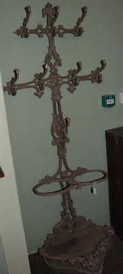 Lot 1357 - A Victorian green painted cast iron hall stand, 3rd quarter 19th century, the back support with two