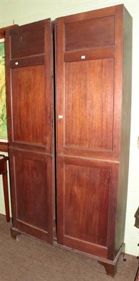 Lot 1362 - A mahogany two door panelled cupboard