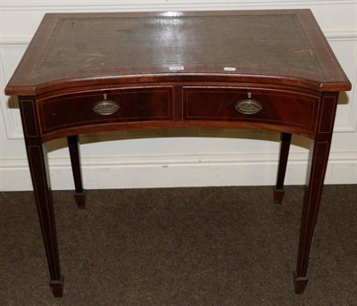 Lot 1376 - An Edwardian mahogany leather inset writing table