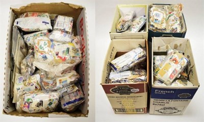 Lot 42 - World Stamps - On and Off Paper. Large plastic crate ( containing 4 smaller boxes ) and a large box