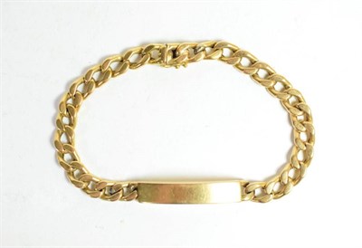 Lot 7 - A curb link identity bracelet with clasp stamped '750', length 24.5cm