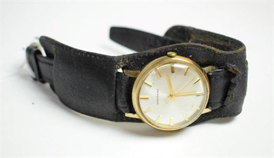 Lot 13 - A 9 carat gold wristwatch, signed Garrard, with a Garrard box