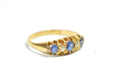 Lot 43 - An early 20th century 18 carat gold sapphire and diamond five stone ring, finger size L1/2