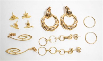 Lot 49 - Three pairs of 9 carat gold drop earrings; a pair of hoop earrings; and two pairs of 18 carat...