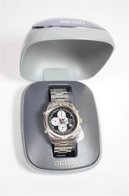 Lot 52 - A stainless steel chronograph calendar alarm wristwatch, signed Seiko , with Seiko box and booklets
