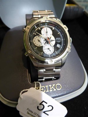 Lot 52 - A stainless steel chronograph calendar alarm wristwatch, signed Seiko , with Seiko box and booklets