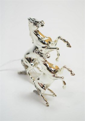 Lot 57 - Two modern cast silver models of rearing horses, London 2006, the largest 10cm long, 4.9ozt (2)