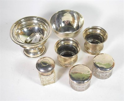 Lot 63 - A selection of silver comprising two beakers; two ingots; a Victorian bowl; a pedestal bowl;...