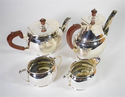 Lot 84 - A silver four piece tea and coffee service, Roberts & Belk, Sheffield 1963, of plain oval...