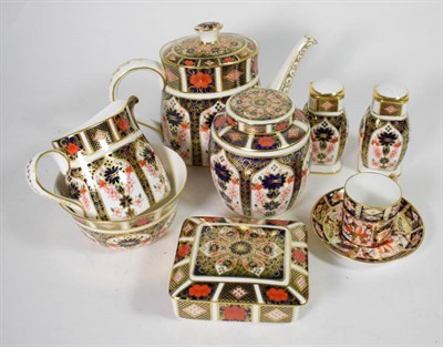 Lot 106 - A tray of Royal Crown Derby Imari teawares; salt and pepper; ginger jar and over etc