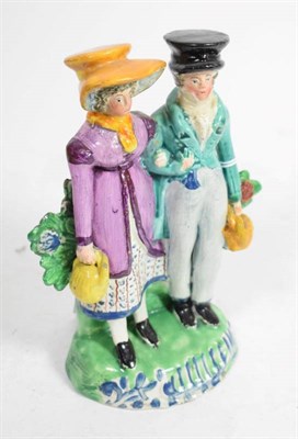 Lot 114 - A Staffordshire pearlware figure group of the Dandies, early 19th century, the fashionably...
