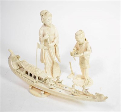Lot 120 - A Japanese ivory figure of a maiden, Meiji period; a similar farmer; and a dragon boat (3)