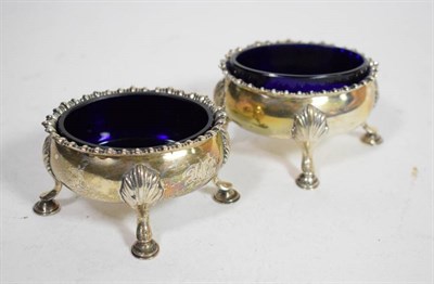 Lot 121 - A pair of early George III silver salts, David & Robert Hennell, London 1766, oval with shaped...