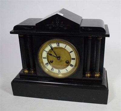 Lot 176 - A Victorian black slate striking mantel clock