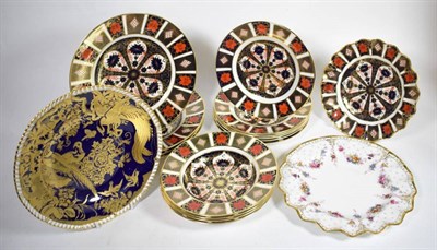 Lot 180 - A shelf of Royal Crown Derby Imari; dinner plates; bowls etc together with a Royal Crown Derby...