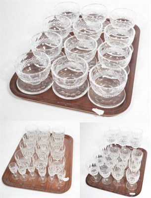 Lot 187 - A part suite of Waterford crystal including wines, tumbler, rinsers and hock glasses (on four...