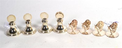 Lot 217 - A matched set of four silver rose name card holders, Birmingham 1998/99; and a further set of...