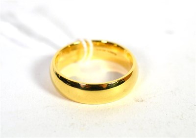 Lot 223 - An 18 carat gold band ring, finger size T