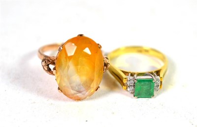 Lot 228 - A dress ring stamped '18K' and '750', finger size L1/2; and another stamped '9ct', finger size P1/2