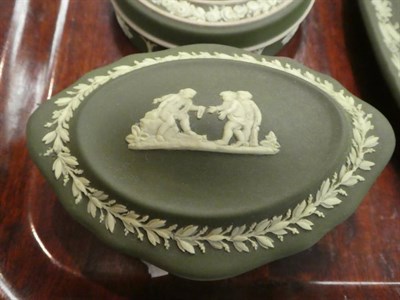 Lot 282 - A late 19th century Wedgwood moss green jasper twin-handled vase; a similar oval tray; two pots and