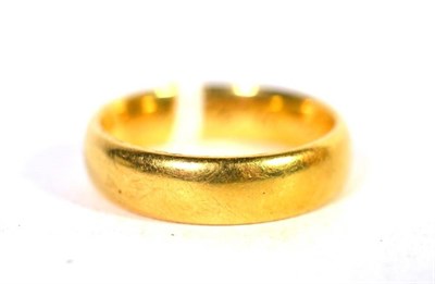 Lot 298 - An 18 carat gold band ring, finger size N1/2